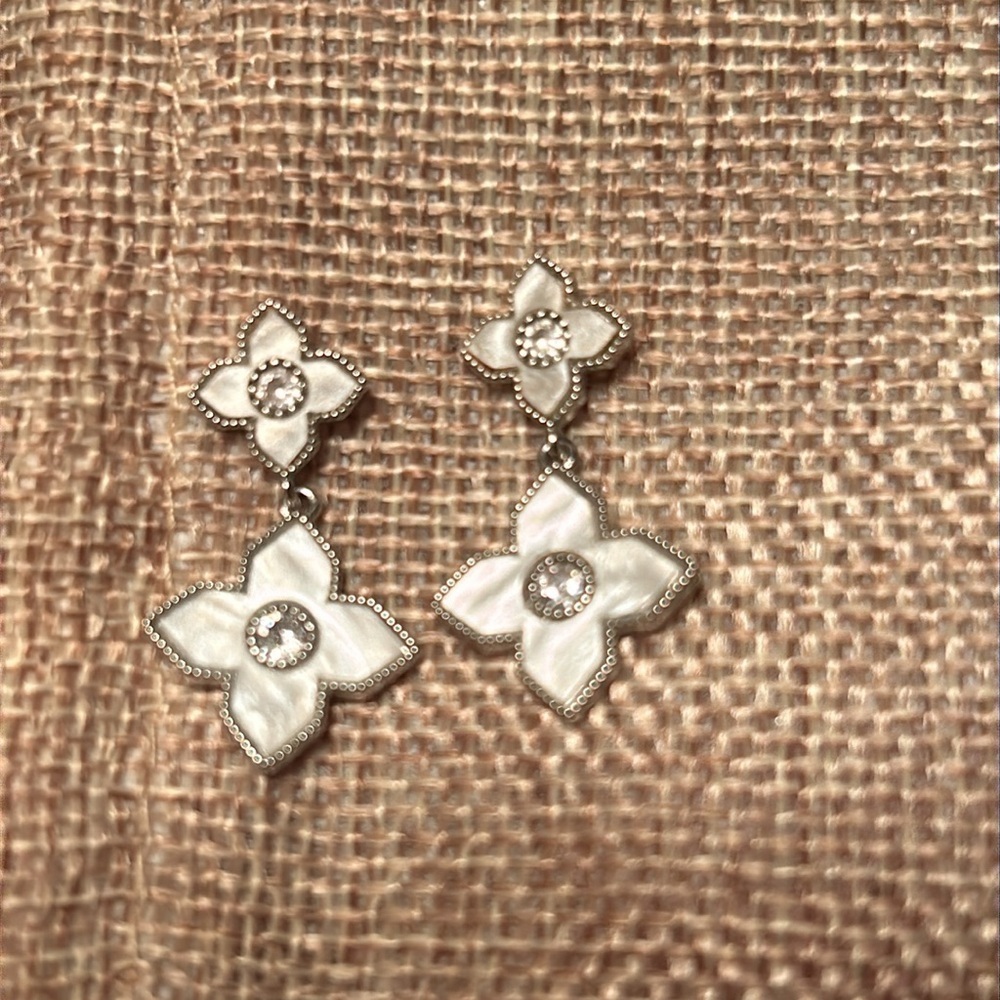 1” mother of pearl and cz dangle earrings.